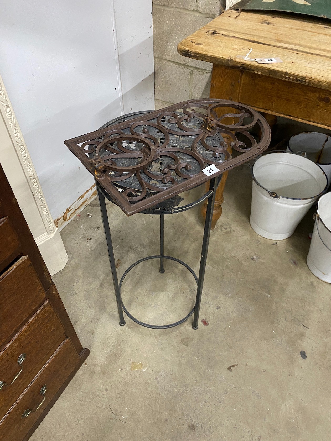 Three metal hanging baskets, a wall mounted pot holder and a stand